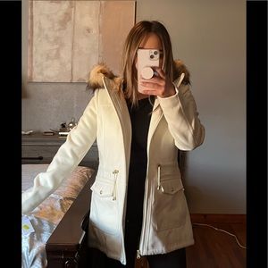 Jessica Simpson white coat